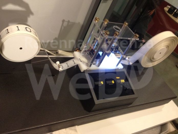 1280px-Model_of_a_Turing_machine