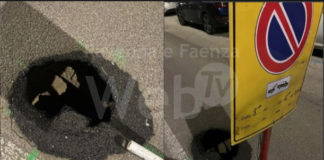 Voragine nell’asfalto in via Croce